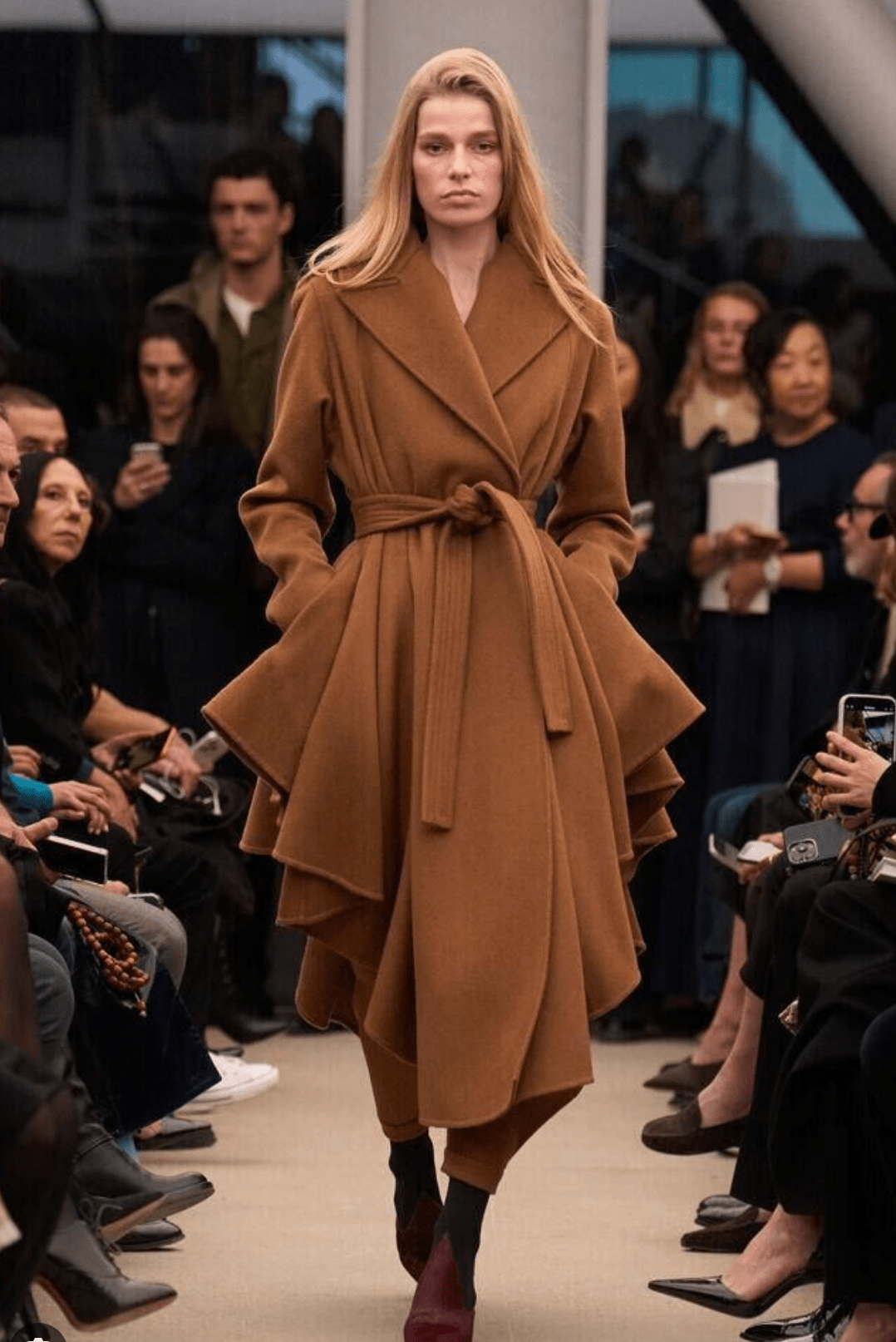 Céline Dion Wore an Asymmetric Caramel Alaïa Trench Coat and Cutout Suede Boots in Paris Céline Dion Wore an Asymmetric Caramel Alaïa Trench Coat and Cutout Suede Boots in Paris